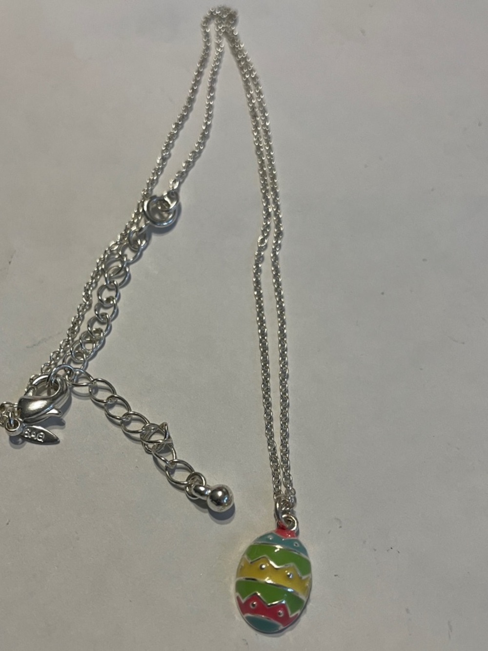 Avon Silver-Tone Necklace with Multicolor Enamel Egg Charm